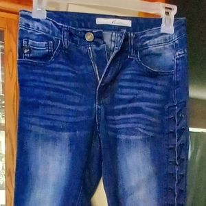 Side laced Kancan skinny jeans